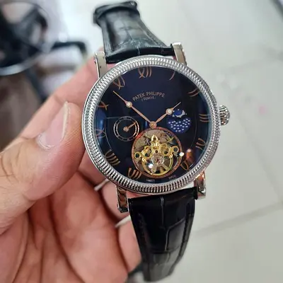 This Patek Philippe timepiece appears to be a Complications model featuring a tourbillon at the 6 o'