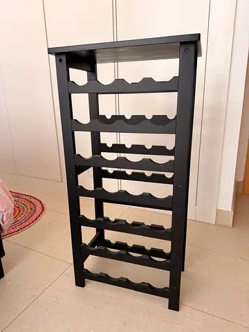 Tall black wooden wine rack - holds multiple bottles, excellent condition