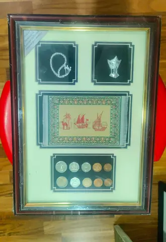 Framed Collectible Coins, Silver Trinkets and Decorative-28x39cm