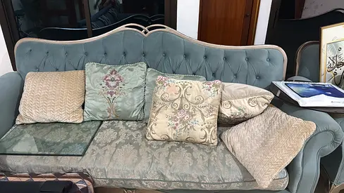 Light teal upholstered 3-seater sofa with cushions - good condition