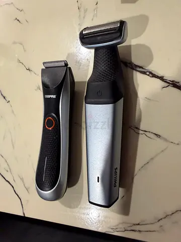 Two electric shavers/trimmers (Philips + Geepas) - good working condition