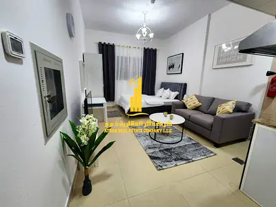 Luxury second-occupancy studio with separate kitchen and open view ✨ Ajman, Jasmine Towers. For monthly rent.