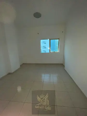 Two-Bedroom Apartment with Living Area and Parking Luxury Vision Real Estate At Luxury Vision Real