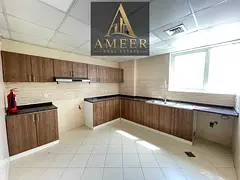 BRIGHT TWO BHK APARTMENT WITH BUILT IN WARDROBES WITH COVERED PARKING FREE ON A VERY PRIME LOCATION