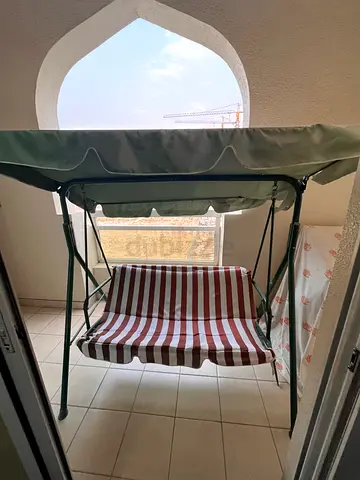 3-Seater Outdoor Swing Canopy | Striped Cushion, Okay Condition