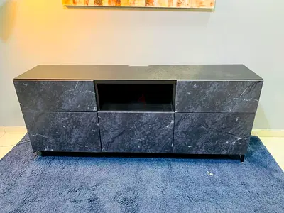 Modern low TV cabinet / media console in grey marble finish