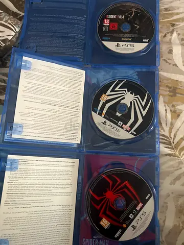 Two PS5 Spider-Man Game Discs (Marvels Spider-Man Collection) + Residential evil