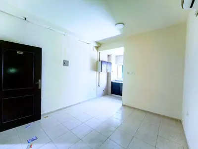 Lavish studio with separate kitchen in front of park building with AC for family only