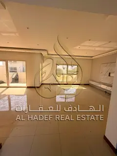 Villa for rent in Al Barashi, Sharjah. 3 bedrooms, living room, maid's room, garden, parking, CCTV, 