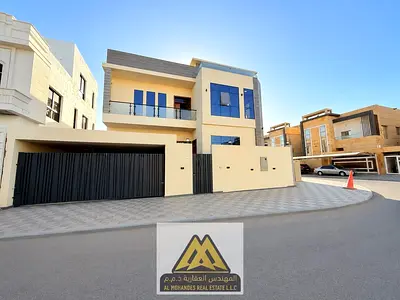 A luxury corner villa available for annual rent in Al Yasmeen, Ajman. Featuring modern architectur