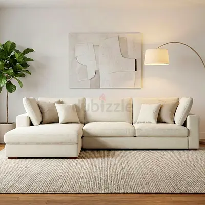 Light beige L-shaped sectional sofa with chaise - modern, roomy 3-seater