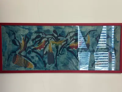 2 framed fabric artworks