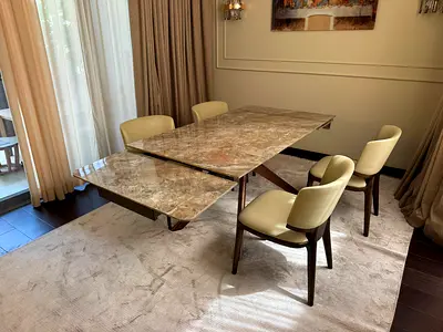 Available high quality Al Huzaifa dining table with chairs like a new