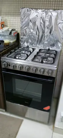 Midea 4 Burner Gas Cooker 60x6 cm Stainless Steel 4-Burner Gas Cooker - Excellent Working Condition