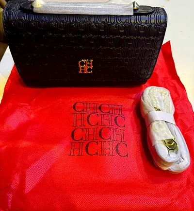 Carolina Herrera CH embossed black crossbody bag with strap (like new)
