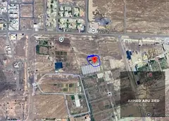 Investment townhouse plot in Al Manama 14, Ajman, near Hamid Bin Rashid Al Nuaimi Mosque. Land area 