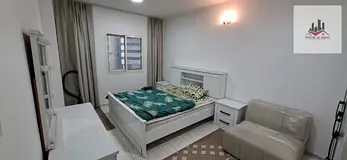 Two-bedroom apartment with a living room for rent in Al Majaz 2; ready for immediate occupancy, feat