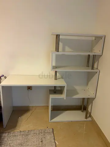 Modular white wall-mounted shelving unit - good condition