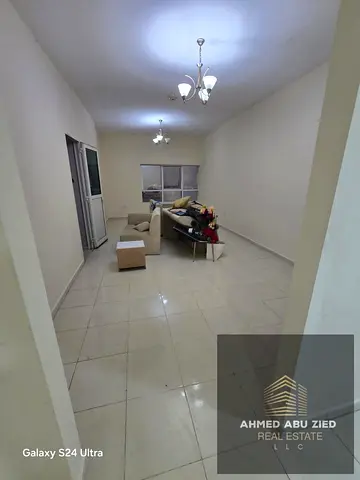 A golden opportunity for annual rent: a luxurious 2-bedroom apartment with a living room in the Al