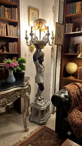 Antique-style cherub floor lamp with multiple arms - statement piece