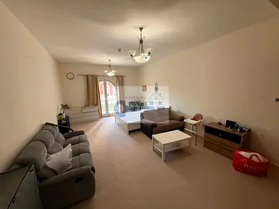 Furnished Studio | Siena 1 JVC | Balcony & Community View