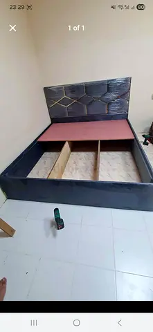 King Storage bed with upholstered headboard — used, good condition