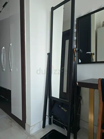 Full-length free-standing mirror with black frame - good condition