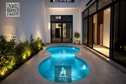 Luxury villa for sale in Al Zahia – Ajman | Two streets with indoor pool