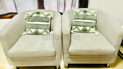 Pair of light grey single-seater armchairs with cushions - good condition