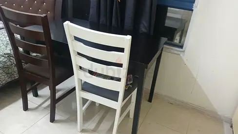 Simple black dining/desk table with two chairs and wardrobe (used)