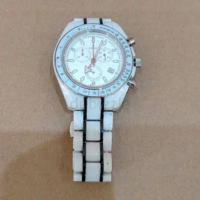 White ceramic chronograph wristwatch with metal accents
