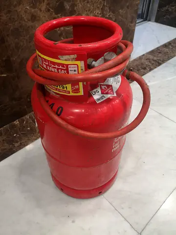 Gas Cylinder ajman 50% gas with regulator and pipe urgent sale