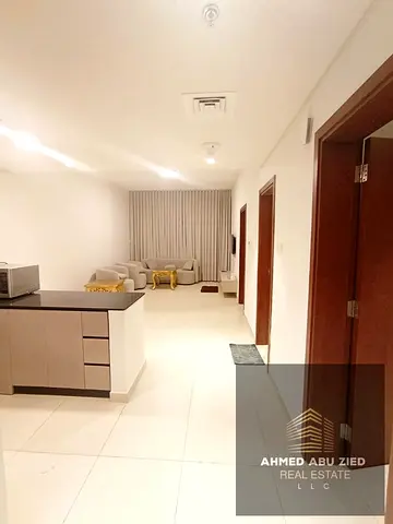 Luxury 1BHK for annual rent in Azha Garden - Ajman, master bedroom, additional room, 2 bathrooms, open views, high finishes, free parking, pool, gym.