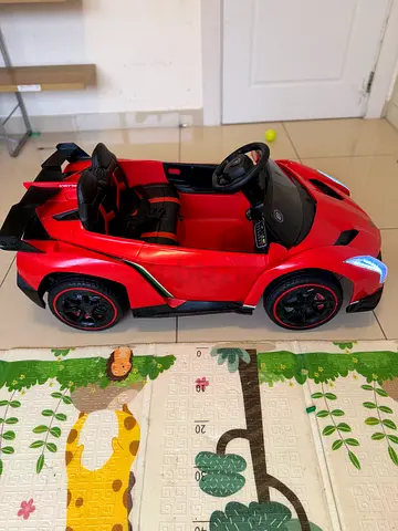 Kids Electric Ride-On Sports Car with Remote Control – AED 50