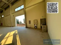 25000 Sq.ft Industrial warehouse with 2 sides mezzanine ,250 KW Electricity for Rent in Umm Al Quwai