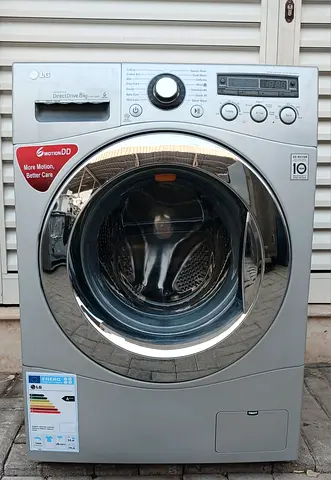 LG 8kg, fully automatic washing machine, with silver color, its condition is working perfectly