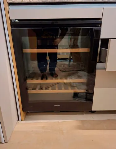 Built-in Miele Wine Cooler – Glass Door, Wooden Shelves, Good Condition