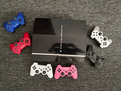 Sony PlayStation 3 console with 7 wireless controllers - working condition