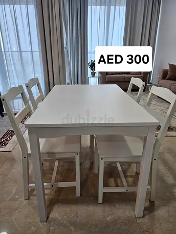 White wooden dining table with 4 chairs - good condition