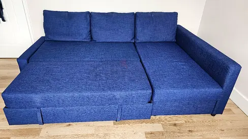 Blue L-shaped Sofa Bed - Converts to Bed, Good Condition