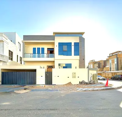 A luxury villa in the Al Yasmin area of ​​Ajman, featuring spacious areas and elegant design, with a location close to vital services and facilities.