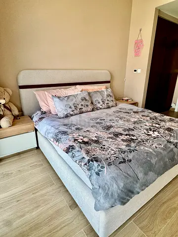 King size upholstered bed with matching nightstands - good condition