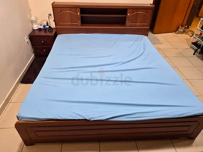 Wooden double bed frame with storage headboard - good condition