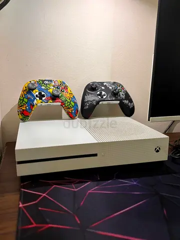 Xbox One S console with 2 custom wireless controllers - good condition