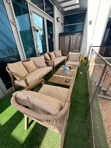 Outdoor 5-piece rattan-style patio sofa set with cushions
