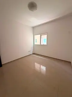 **Annual Apartment for Rent – Al Khan, Sharjah** One-bedroom apartment with a living room Two bath