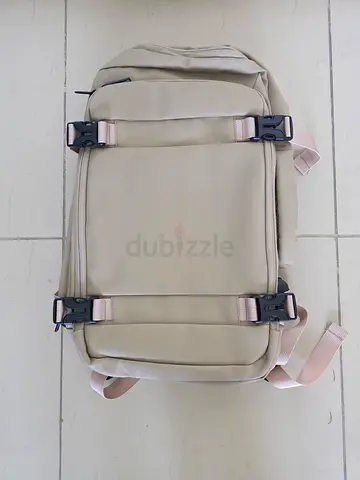 Beige airplane cabin backpack with buckle straps - brand new, never used