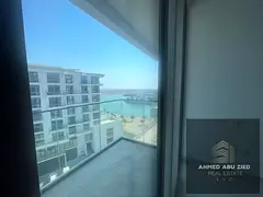 Studio apartment for annual rent in Al Hamriya, Ajman. Features include a balcony with sea views, ce