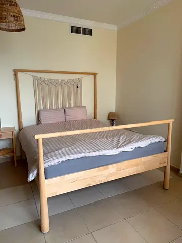 ikea Gjora bed with a BJÖRKSNÄS Nightstand and ikea spring mattress