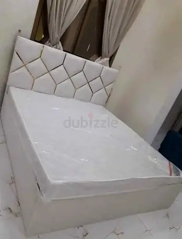 White Upholstered Double Bed with Geometric Headboard